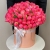 Композиция в шляпной коробке из 113 пионов Корал Шарм в Раменском