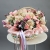Композиция в корзине "Диодора" из французских роз Квиксенд, диантусов и кустовых пионовидных роз Бомбастик в Раменском